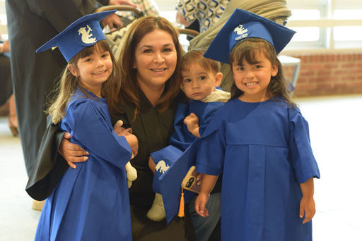 Graduate with Children.jpg