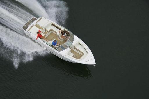 Boat-cruising-on-water-scaled.jpg